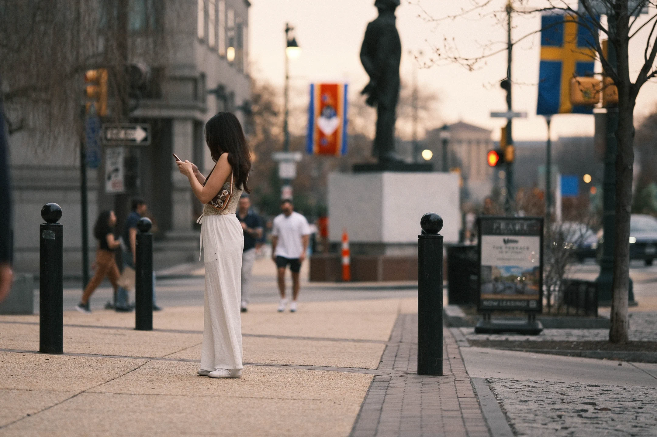 urban woman looking at her phone